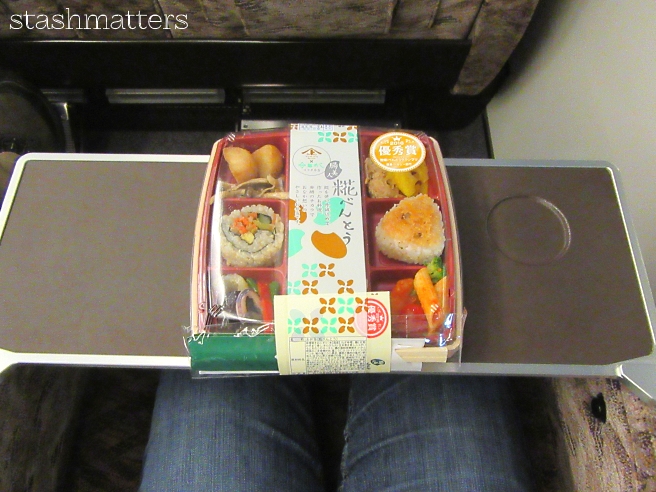 When travelling by train, it's common to pick up a bento box type meal to eat on the train.